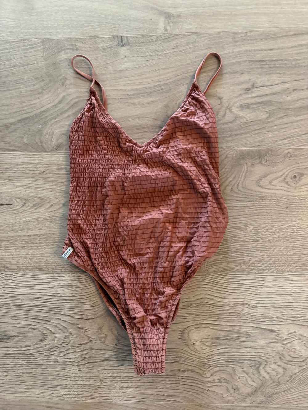 Rhythm. Smocked One-Piece Swimsuit in Rust